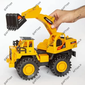 Plastic toy excavator in hand