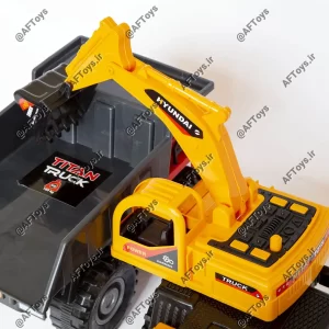 close up excavator rotated towards a dump truck
